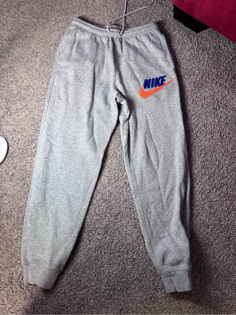 Nike Men’s Gray Sweatpants with Blue Logo and Orange Swoosh